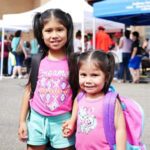 Two Girls with Backpacks